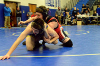 Cole Steffensen wrestles a battle creek opponent