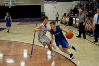 Anthony Haberman drives against Lincoln McPhillips