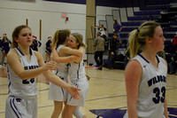 Abbe Morten and willa Scoville hug at the end of the game, celebrating the record
